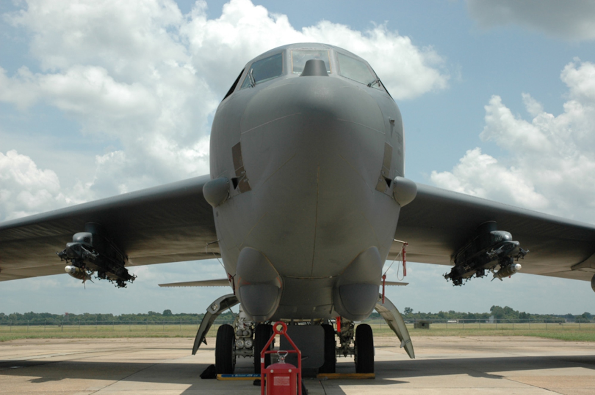 A  B-52 Stratofortress  from the 49th Test and Evaluation Squadron loaded with two Laser Joint Direct Attack Munitions awaits its mission at Barksdale Air Force Base, La., July 10.  The 49th TES demonstrated the B-52's  LJDAM capablity on a target on the after a cross country flight.  The target was stationary, but the 49th plans to demonstrate the LJDAM on a moving target soon.  The laser piece of the munition allows for updated targeting and adjustments to moving targets.  Photo by Boeing.  