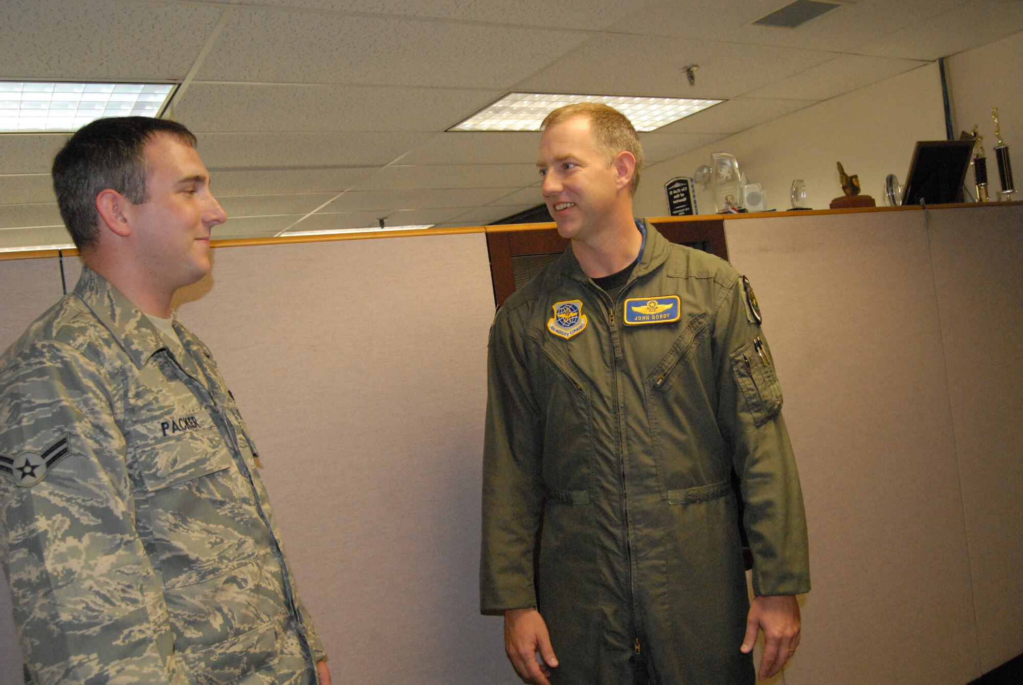 Col. John Gordy II, 43rd Airlift Wing Vice Commander, talks to Airman 1st Class Christopher Packer, 43rd Force Support Squadron, during a tour of the Military Personnel Flight Wednesday. (U.S. Air Force Photo by Airman 1st Class Mindy Bloem)
