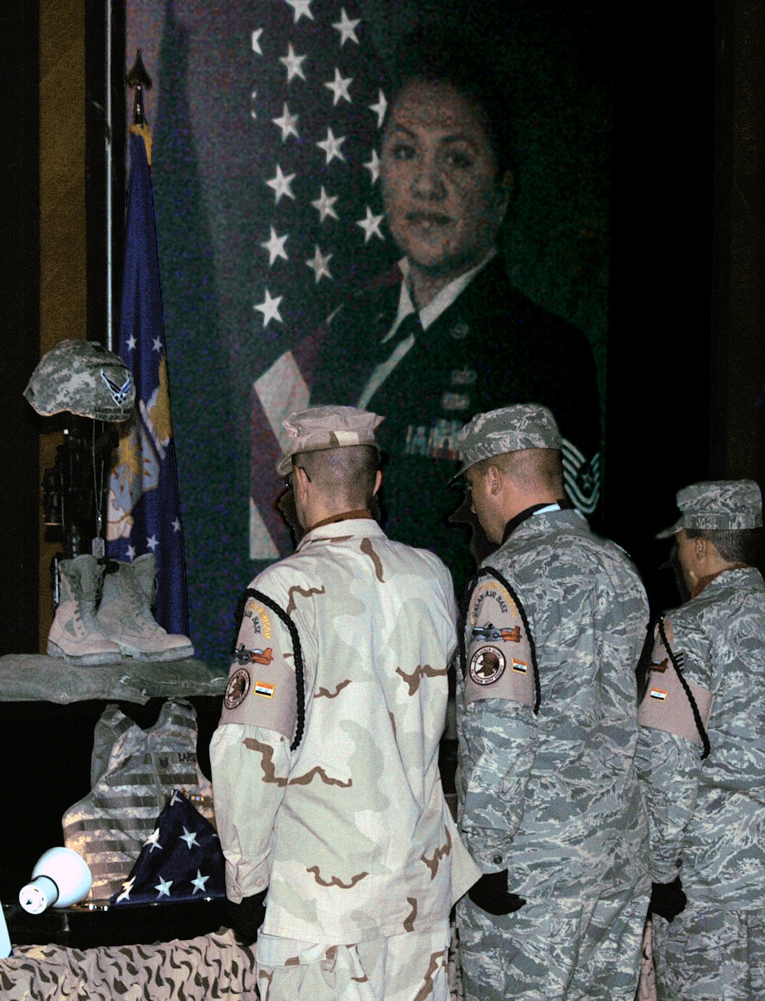 Airmen with the Joint Base Balad Honor Guard take part in a memorial service for Tech. Sgt. Jackie Larsen at the Joint Base Balad Town Hall July 20 in Iraq. Sergeant Larsen, who died from non-combat related causes July 17, was a paralegal working with the Law and Order Task Force of the 732nd Expeditionary Support Squadron. Her duties placed her at Forward Operating Base Shield where she served as the NCO in charge of all personnel movements for the LAOTF. She was deployed from Beale Air Force Base, Calif. and her hometown was Tacoma, Wash. (U.S. Air Force photo/Tech. Sgt. Richard Lisum)