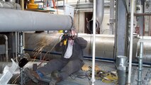 Lannie Jenkins, an Aerospace Testing Alliance pipefitter at the Propulsion Wind Tunnel, prepares a section of piping for a weld-in expansion joint as part of a major Engine Test Facility-focused maintenance and repair outage on base. (Photo by Warner Holt)