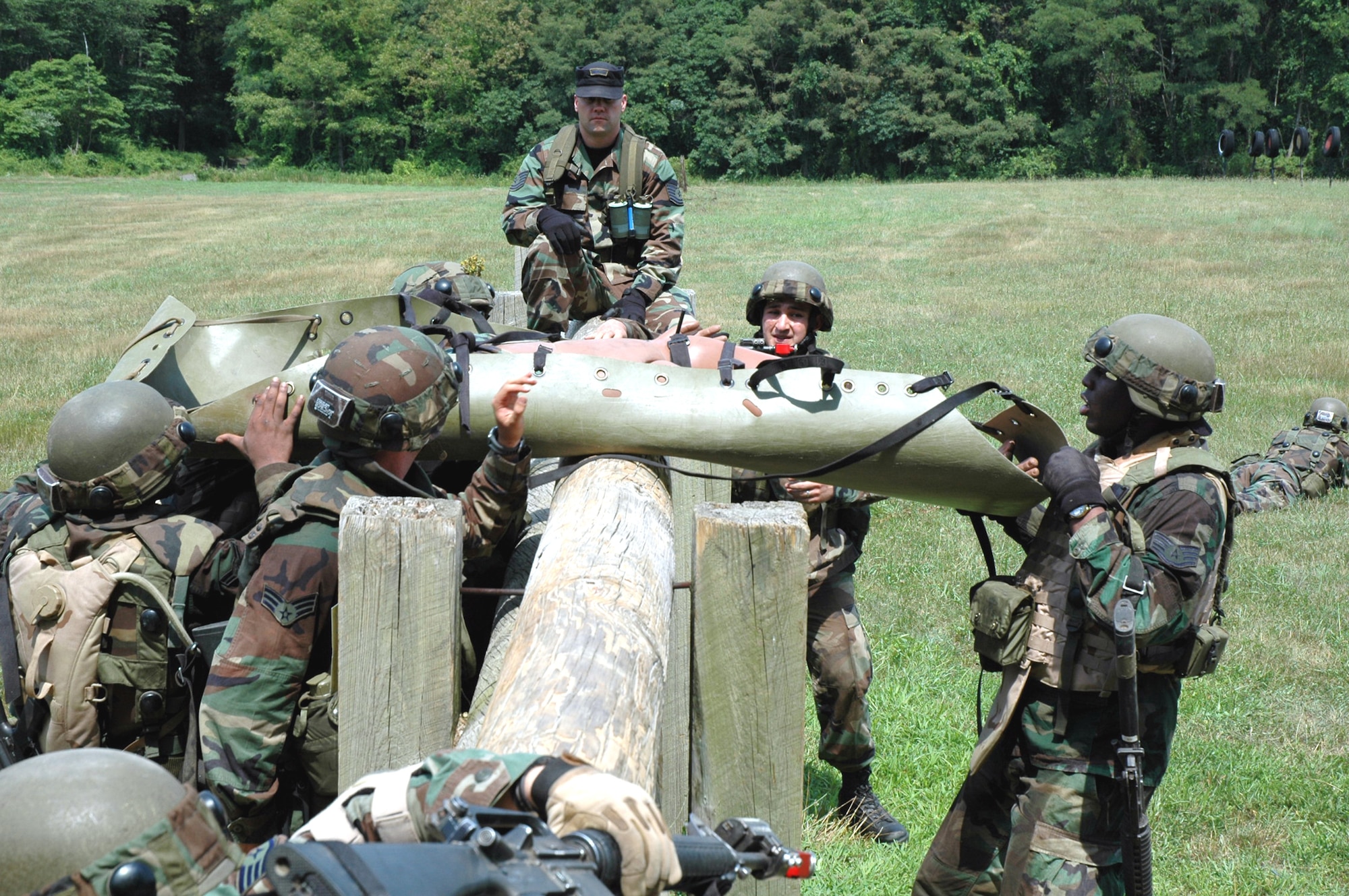 Students in the Advanced Contingency Skills Training Course 08-5 practice combat first aid training on a Fort Dix, N.J., range July 17, 2008.  ACST, taught by the U.S. Air Force Expeditionary Center's 421st Combat Training Squadron, prepares Airmen for upcoming deployments.  (U.S. Air Force Photo/Staff Sgt. Paul R. Evans)
