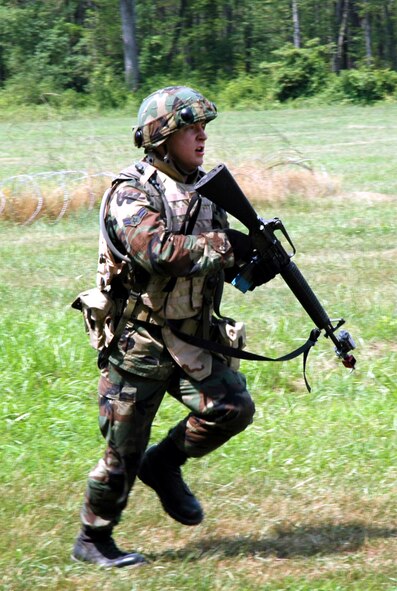 A student in the Advanced Contingency Skills Training Course 08-5 practices combat first aid training on a Fort Dix, N.J., range July 17, 2008.  ACST, taught by the U.S. Air Force Expeditionary Center's 421st Combat Training Squadron, prepares Airmen for upcoming deployments.  (U.S. Air Force Photo/Staff Sgt. Paul R. Evans)