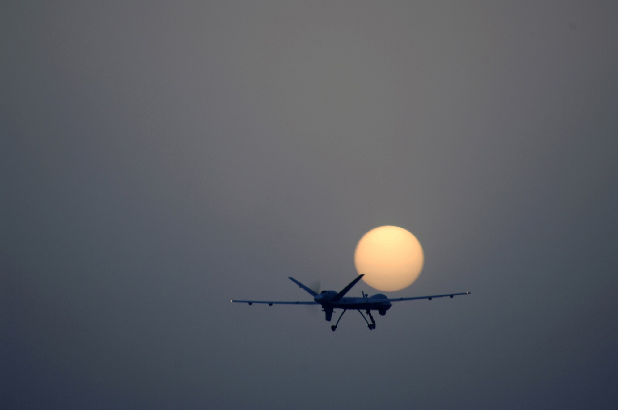 An MQ-9 Reaper remotely piloted aircraft takes off July 17 from Joint Base Balad, Iraq. The Reaper can loiter over battlefields or targets for hours at a time without refueling and carries up to 3,750 pounds of laser-guided munitions, giving ground commanders unprecedented situational awareness and the ability to bring the right amount of force to bear on a target. The Reaper, deployed from Creech Air Force Base, Nev., flew its first combat mission over Iraq July 18. (U.S. Air Force photo/Tech. Sgt. Richard Lisum) 
