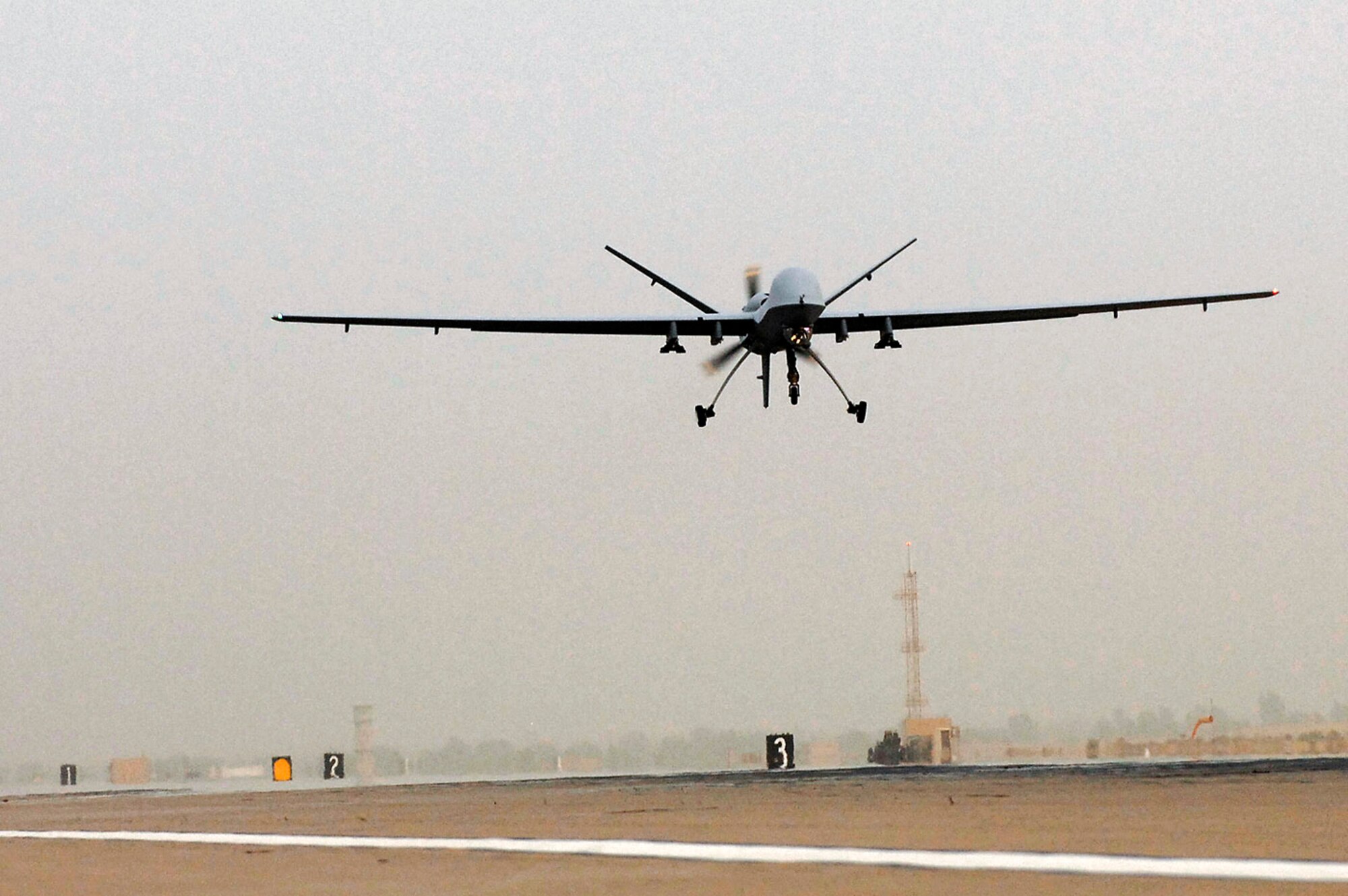 An MQ-9 Reaper remotely piloted aircraft takes off July 17 from Joint Base Balad, Iraq. The Reaper can loiter over battlefields or targets for hours at a time without refueling and carries up to 3,750 pounds of laser-guided munitions, giving ground commanders unprecedented situational awareness and the ability to bring the right amount of force to bear on a target. The Reaper, deployed from Creech Air Force Base, Nev., flew its first combat mission over Iraq July 18. (U.S. Air Force photo/Senior Airman Julianne Showalter) 
