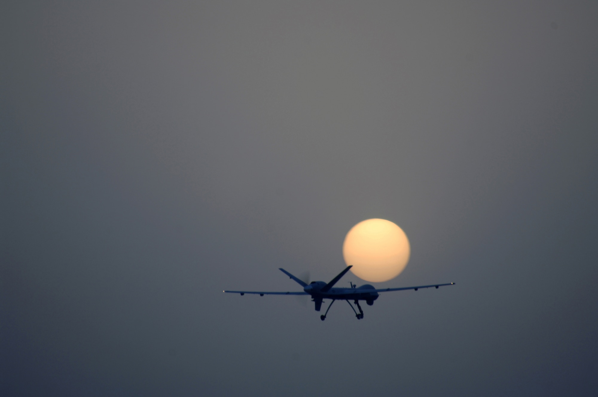 JOINT BASE BALAD, Iraq -- An MQ-9 Reaper remotely piloted aircraft takes off from Joint Base Balad, Iraq, July 17. The Reaper can loiter over battlefields or targets for hours at a time without refueling and carries up to 3,750 pounds of laser-guided munitions, giving ground commanders unprecedented situational awareness and the ability to bring the right amount of force to bear on a target. The Reaper, deployed from Creech Air Force Base, Nev., flew its first combat mission over Iraq July 18. (U.S. Air Force photo/Tech. Sgt. Richard Lisum)