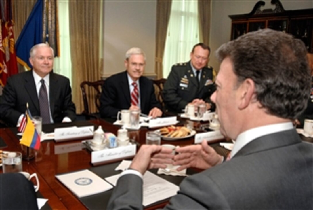 U.S. Defense Secretary Robert M. Gates (left) hosts a Pentagon meeting, July 23, 2008, with Colombian Minister of Defense Juan Manuel Santos (right foreground). Gates began the meeting by complementing Santos and his military forces for the recent rescue of 15 hostages being held in the Colombian jungle by the Revolutionary Armed Forces of Colombia. 