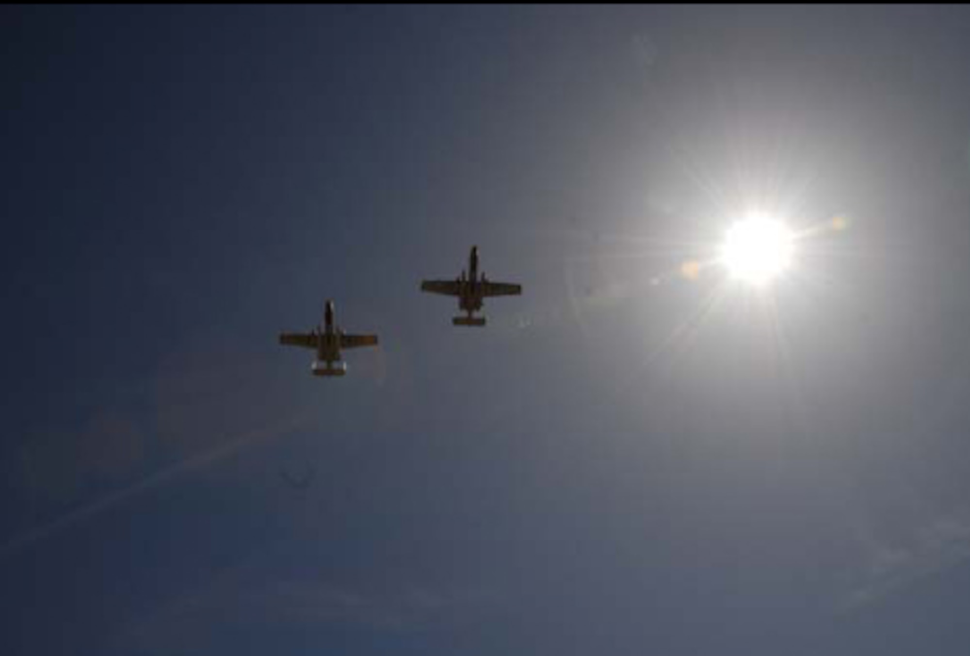 Pilots from Fort Smith, Arkansas flew the last of Bradley’s A-10s over the main hangar, giving the assembled crowd a chance to wave goodbye. (U.S. Air Force Photo by Maj. George Worrall III) 