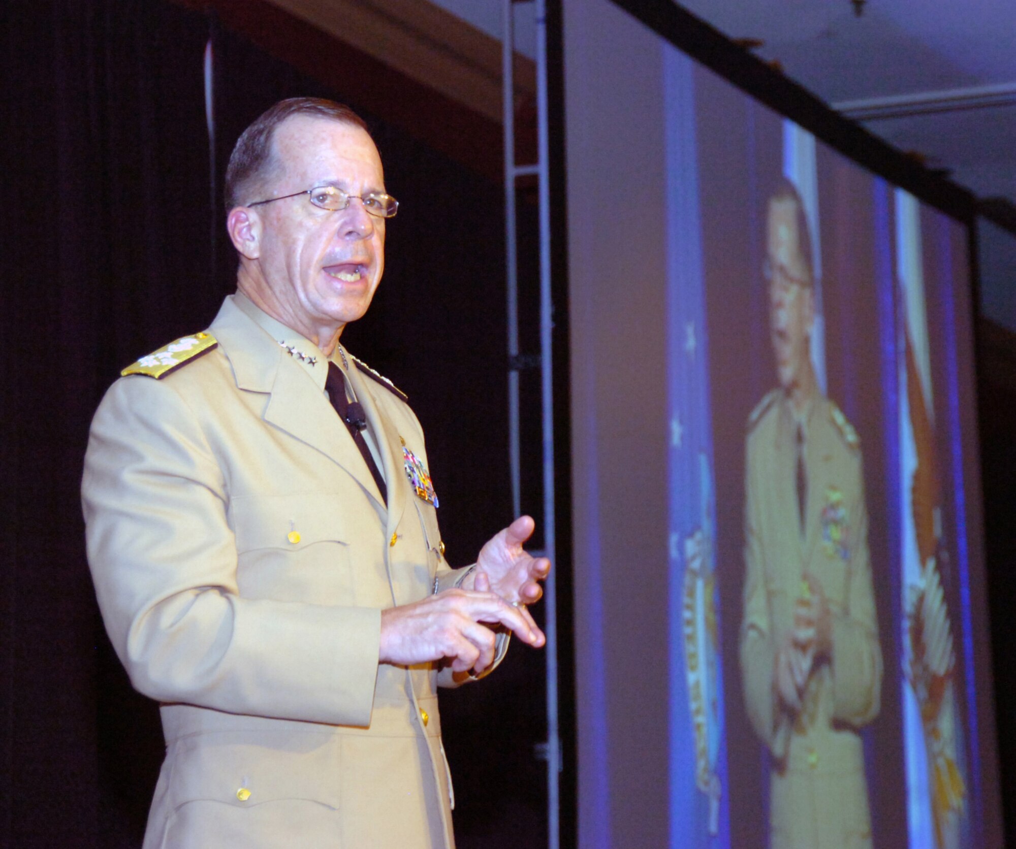 Adm. Michael Mullen, the chairman of the Joint Chiefs of Staff,
tells 1,500 people gathered for the largest-ever National Guard Bureau Joint Family Program Volunteer Workshop and Youth Symposium in St. Louis, Mo., on July 21, 2008, that caring for wounded servicemembers and the families of those killed serving their country is a national responsibility. ?In the end, it?s America that can do this,? Mullen says. ?It?s not DoD, and it?s not the VA. We?ve all got to do this together.? (U.S. Army photo by Staff Sgt. Jim Greenhill) (Released)
