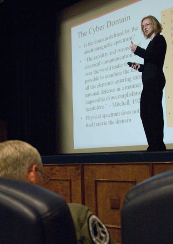 Dr. Rebecca Grant, president of IRIS Independent Research, speaks to attendees on policy issues and the nature of cyberspace at the Cyberspace Symposium July 15. (Air Force photo by Melanie Rodgers)