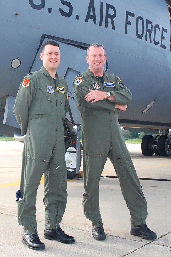 Lt. Col. Robert Nicholson (right) of Air Force Reserve Command's Detachment 2, 4th Air Force, poses with his oldest son, Capt. David Nicholson of the Michigan Air National Guard's 127th Air Refueling Group, at Selfridge Air National Guard Base, Mich. The occasion was Colonel Nicholson's final KC-135 flight before his retirement after 37 years of service. (Courtesy photo)
