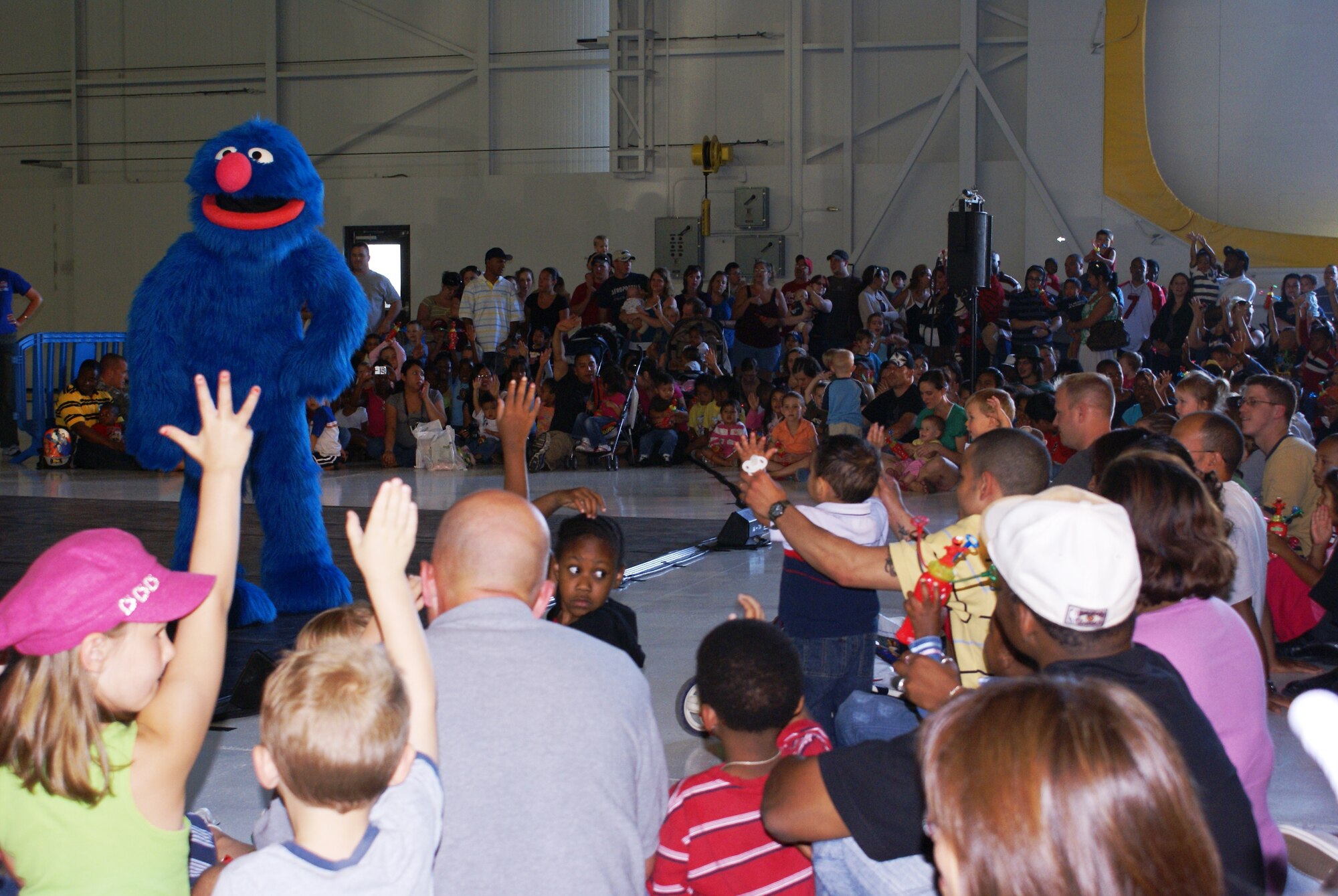 More than 1700 children and their families enjoyed the first Sesame Street Experience performance here July 24 in Hanger 9. A second performance was held here July 25. (U.S. Air Force photo/Staff Sgt. Eric Burks)