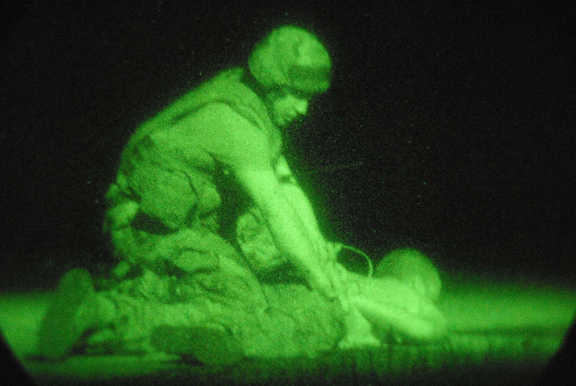 Senior Airman Robert Spears apprehends a suspicious person during a peninsula wide operational readiness exercise July 22 at Kunsan Air Base, South Korea. The base members are participating in the PENORE to evaluate readiness and ability of base members to conduct their wartime mission. Sergeant Spears 8th Security Forces Squadron(U.S. Air Force photo/Senior Airman Gustavo Gonzalez) 