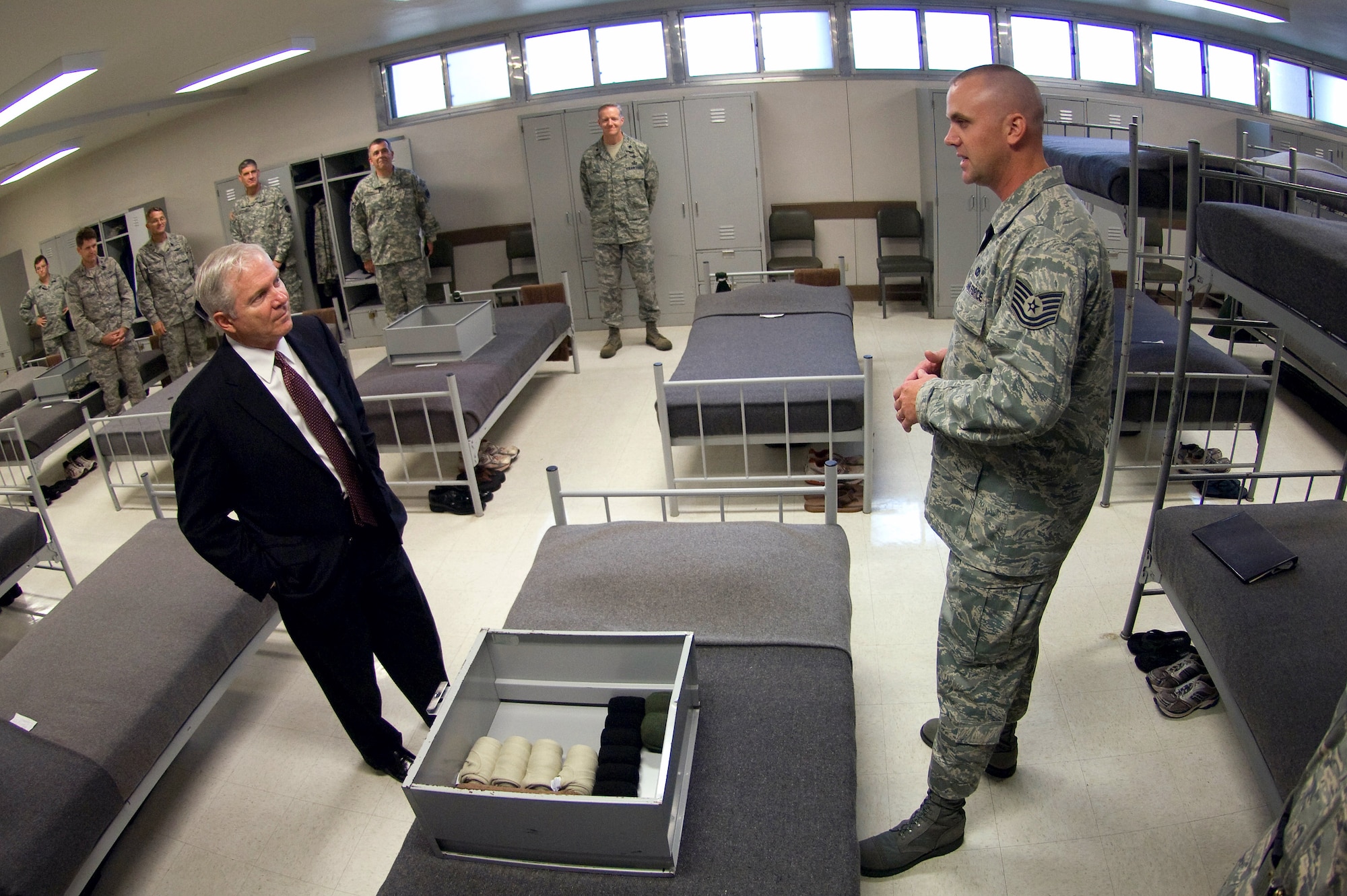 Secretary of Defense Robert M. Gates receives a tour of a basic military taining dormitory during a visit July 24 to Lackland Air Force Base,Texas.  (Department of Defense photo/Cherie Cullen) 