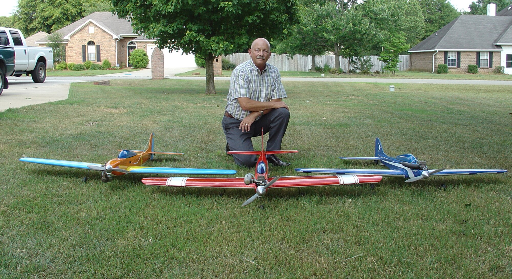Ed Stefan, Radio and Wireless Communications Systems chief in the 78th Communications Group, displays some of his favorite models. Mr. Stefan picked up the remote aircraft hobby while working in his father's Tennessee hobby shop at age 13. Courtesy photo    
