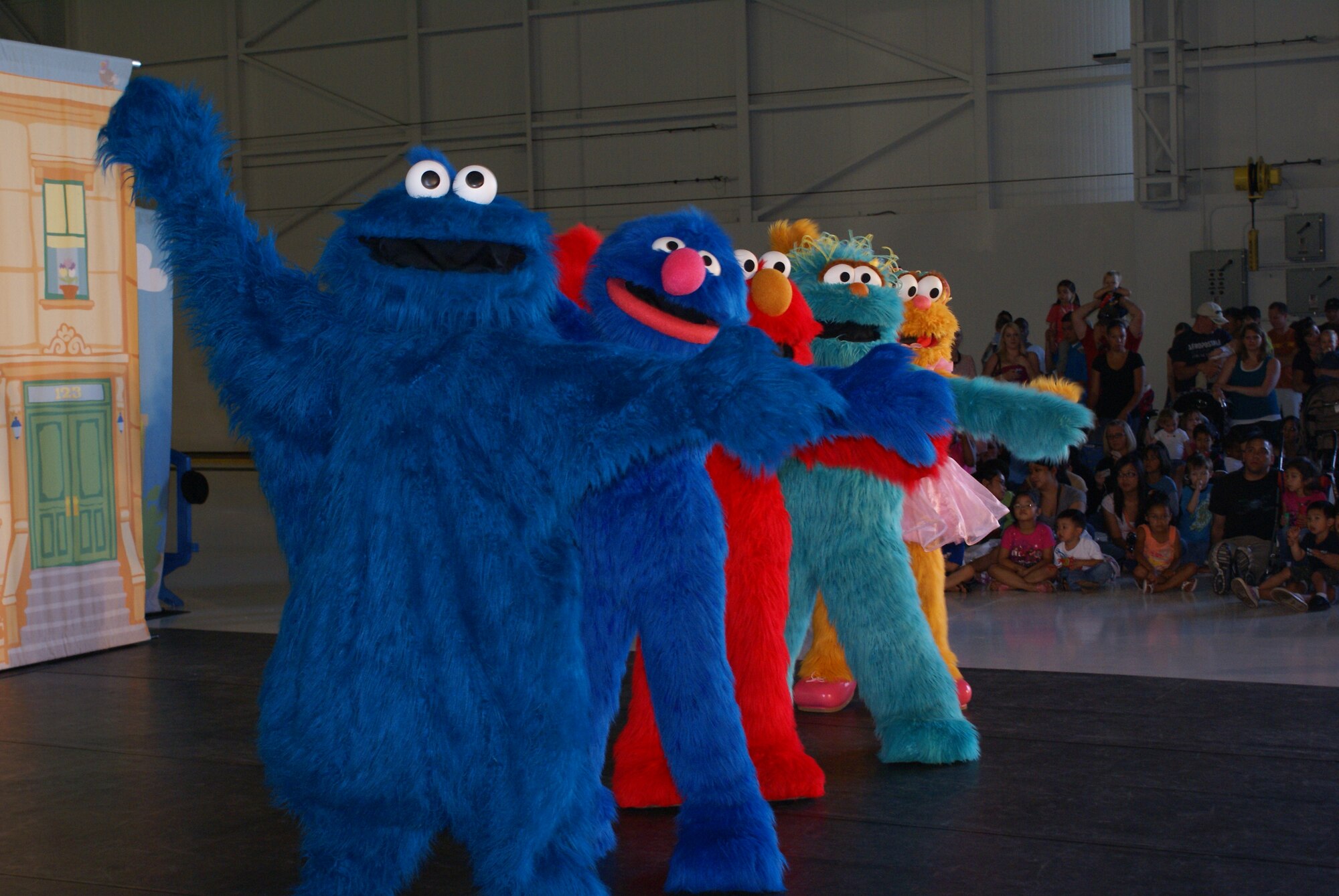 More than 1700 children and their families enjoyed the first Sesame Street Experience performance here July 24 in Hanger 9. A second performance was held here July 25. (U.S. Air Force photo/Staff Sgt. Eric Burks)