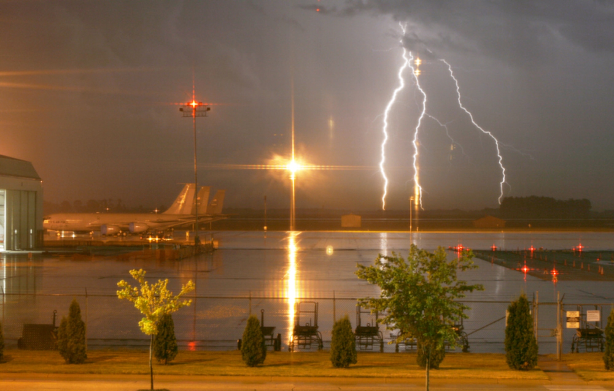 GRISSOM AIR RESERVE BASE, Ind., -- Lightning bolts split the sky during a recent thunderstorm at Grissom ARB.  Thanks to weather warnings that display on base computers systems, Grissom personnel know when severe weather is headed their way.  (U.S. Air Force photo/Senior Airman Christopher Bricker)