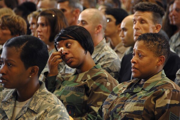 Andersen Airmen, deployed personnel, friends and family mourn the six Airmen who died July 21 when their B-52 Stratofortress crashed. The “Raider 21” crew was scheduled to perform a flyover of Guam’s Liberation Day Parade. Andersen held a memorial ceremony here for the aircrew July 25. (U.S. Air Force photo by Airman 1st Class Courtney Witt) 