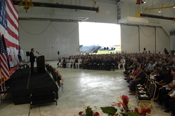 Brig. Gen. Douglas Owens, 36th Wing commander, delivers a heartfelt message to more than 1,800 guests who attended a memorial ceremony July 25 at Andersen’s Hangar One. The ceremony honored the six Airmen who died when their B-52 crashed July 21, 25 miles off the coast of Guam. Their mission was to fly over Guam’s Liberation Day parade celebrating the island’s liberation from Japanese occupation in World War II. (U.S. Air Force photo by Airman 1st Class Courtney Witt) 