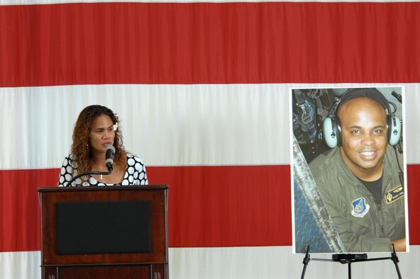 Ursula Martin, wife of Col. George Martin, thanks the myriad of agencies July 25 for their search for the Airmen who lost their lives in the B-52 crash July 21. Colonel Martin, 36th Medical Group deputy commander, was on “Raider 21” when it crashed 25 miles off the coast of Guam. Mrs. Martin, who stands next to a photo of her husband, also extended her gratitude to Andersen’s Airmen and families for their support and shared her condolences with the families of the other aircrew members. (U.S. Air Force photo by Airman 1st Class Corey Todd) 