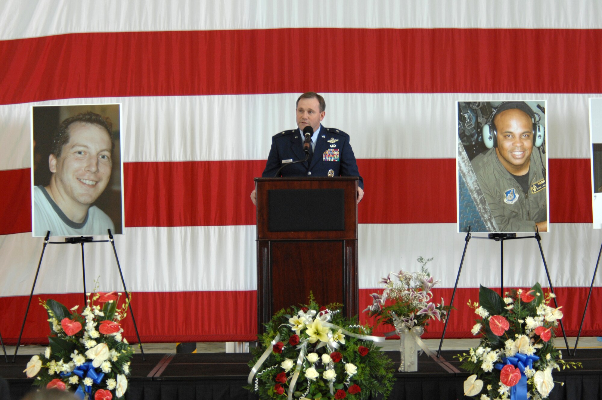 ANDERSEN AIR FORCE BASE, Guam - Brig. Gen. Doug Owens, 36th Wing commander, delivers a heartfelt message to more than 1,800 guests who attended a memorial ceremony Friday at Andersen’s Hangar One.  The ceremony honored the six Airmen who died when their B-52 crashed Monday 25 miles off the coast of Guam.  Their mission was to fly over Guam’s Liberation Day parade celebrating the island’s liberation from Japanese occupation in World War II.  (U.S. Air Force photo by Airman 1st Class Corey Todd)

