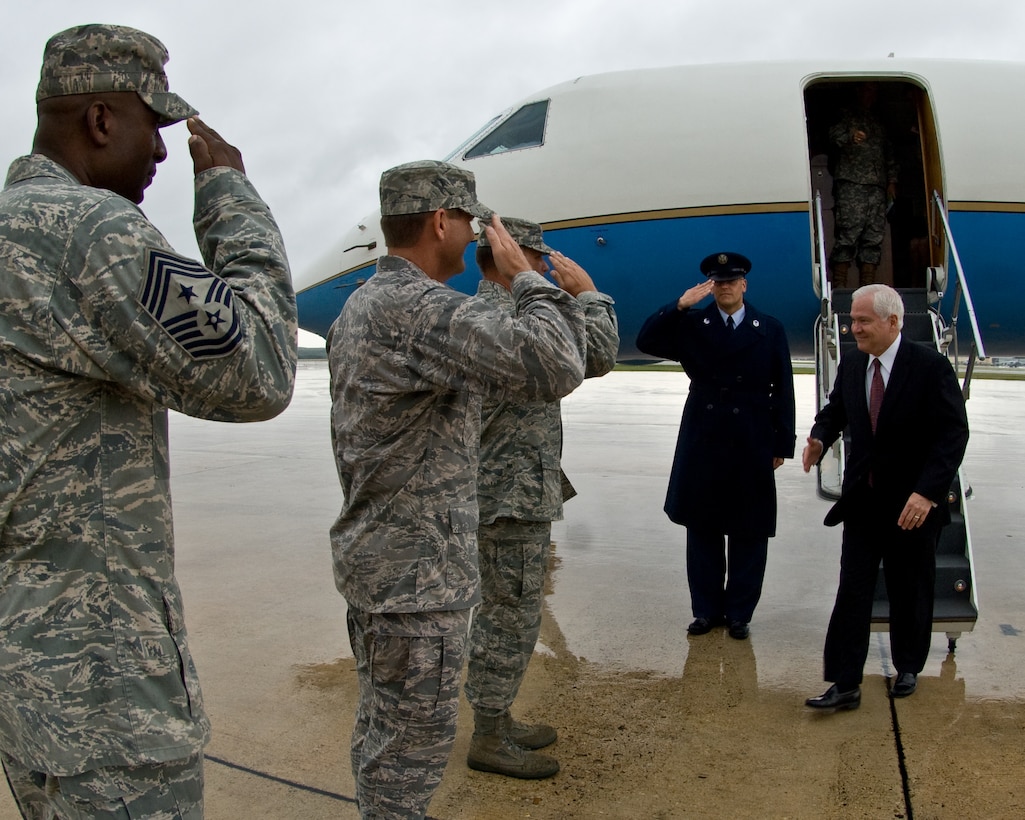 U.S. Air Force Brig. Gen. Leonard Patrick, Col. Eric Wilbur and Chief Master Sgt. Juan Lewis greet Defense Secretary Robert M. Gates upon his arrival at Kelly Air Force Base in San Antonio, Texas, July 24, 2008.  