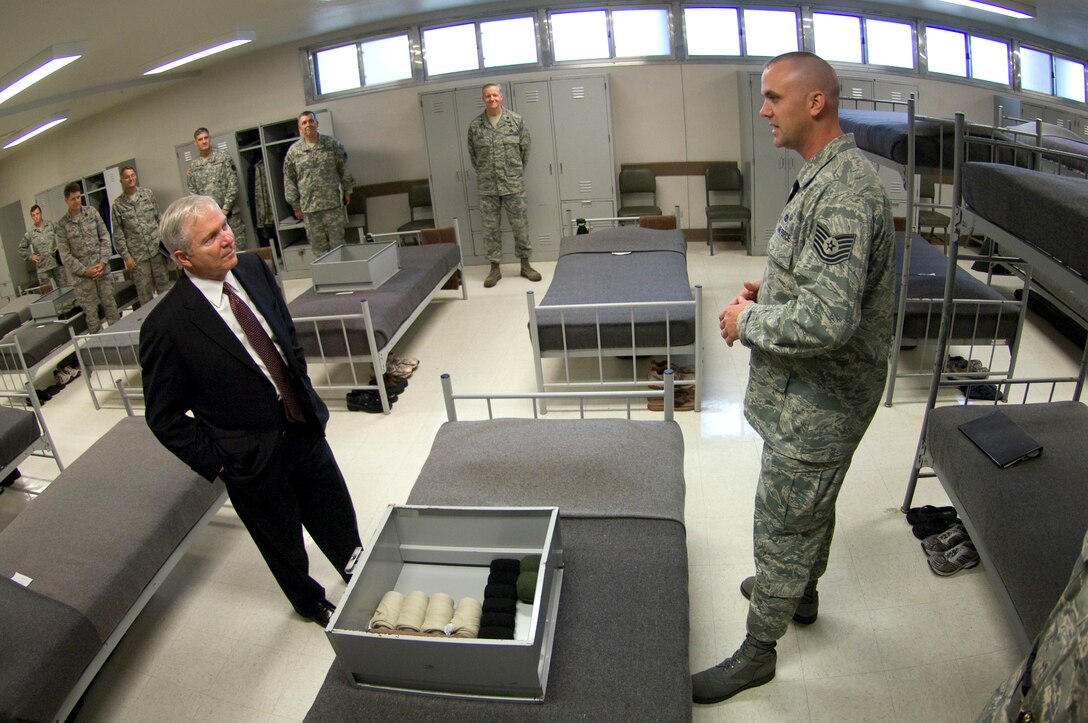 Defense Secretary Robert M. Gates receives a tour of the Basic Military Training dormitory during a visit to Kelly and Lackland Air Force Bases in San Antonio, Texas, July 24, 2008.