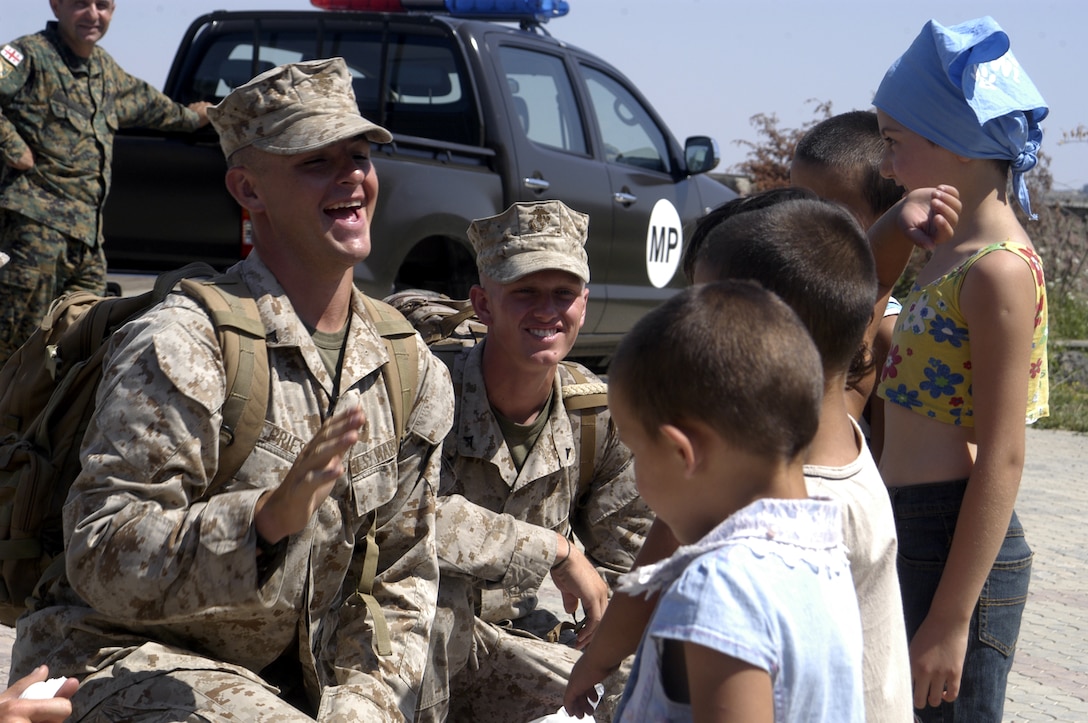 After the initial introductions at the Tsavkisi hospice for Homeless Children near Tbilisi, Georgia, the children warmed up to the Marines of 3rd Battalion, 25th Marine Regiment. The leathernecks were there to bring furniture, supplies, toys and candy to the children and got the opportunity to play with them.