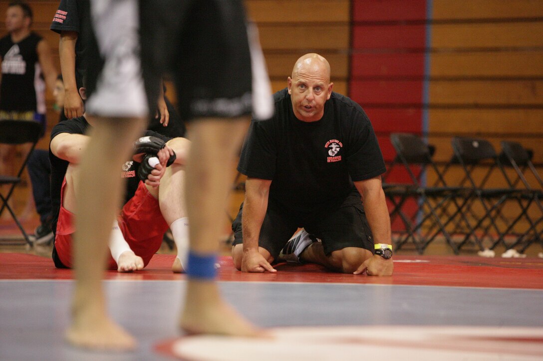 Mark M. Geletko, Fight Club 29 coach, gives his guidance to a fighter during the USA National Pankration Team Championships tournament held at Santa Ana High School in Orange County, Calif., Saturday, July 26, 2008.