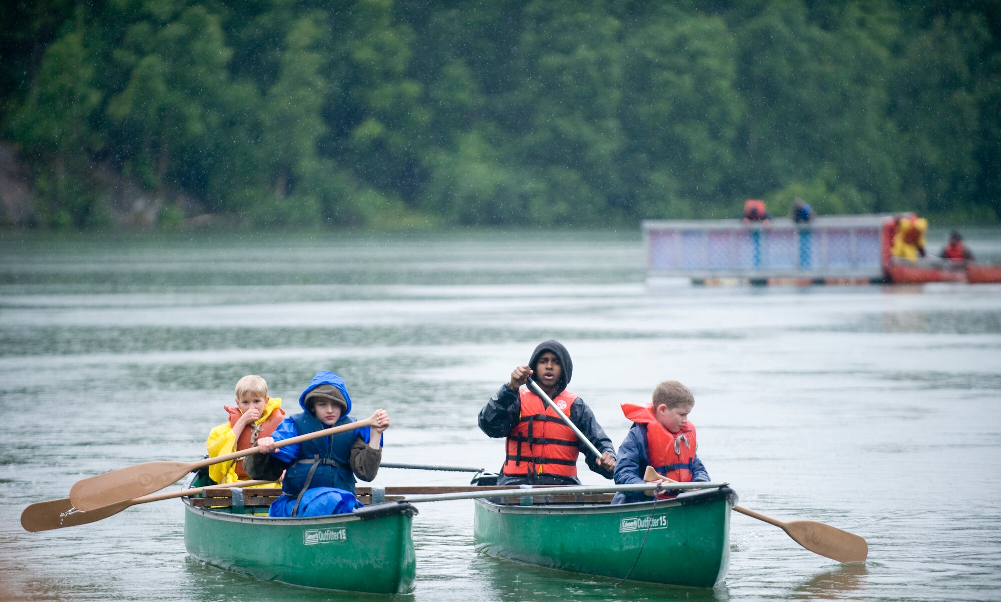 CHUGIAK, Alaska ? Elmendorf Air Force Base Cubs Scout Pack 110 canoe around Mirror Lake at Camp Carlquist July 23. Pack 110 had 38 cub scouts at Camp Carlquist where they shot bows and arrows and other activities. (U.S. Air Force photo/Senior Airman Jonathan Steffen)