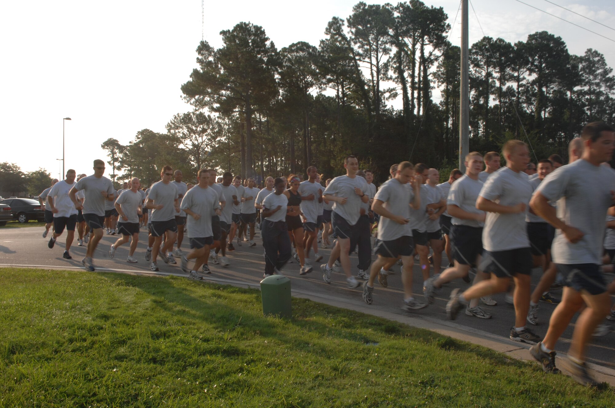Runners take off from the starting line during the 5K fun run at the Aderholt Fitness Center July 28. The 5K was one of many events the Aderholt hosted to celebrate its reopening after being closed for renovations since November 2007. (U.S. Air Force photo/Airman 1st Class Kimberly Darnall)