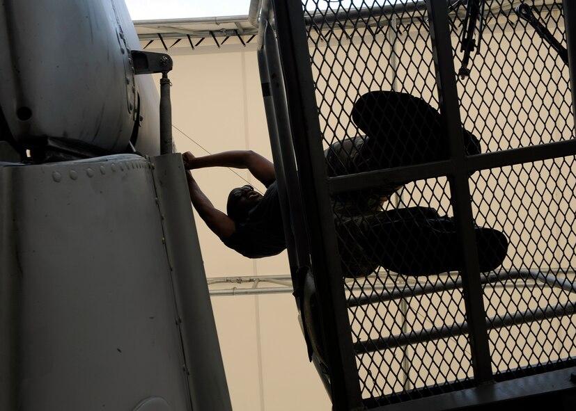 MOODY AIR FORCE BASE, Ga. -- Airman 1st Class Antonio Prioleau, 23rd Aircraft Maintenance Squadron A-10C Thunderbolt II crew chief, changes a part on a rudder on an A-10C aircraft here July 25. Regular inspections and maintenance are essential to keeping the aircraft mission ready. (U.S. Air Force photo by Airman 1st Class Brittany Barker)