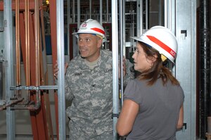 LANGLEY AIR FORCE BASE, Va. -- Col. Dionysios Anninos, Army Corps of Engineers Norfolk District commander and Ms. Catherine Field Langley Air Force Base Hospital Resident Office resident engineer, tour the hospital construction site July 25. Construction is due to be completed by February 2009 with the new part of the hospital scheduled to open in the summer of 2009 after all the proper equipment has been moved in. (U.S. Air Force photo/Tech. Sgt. April Wickes)