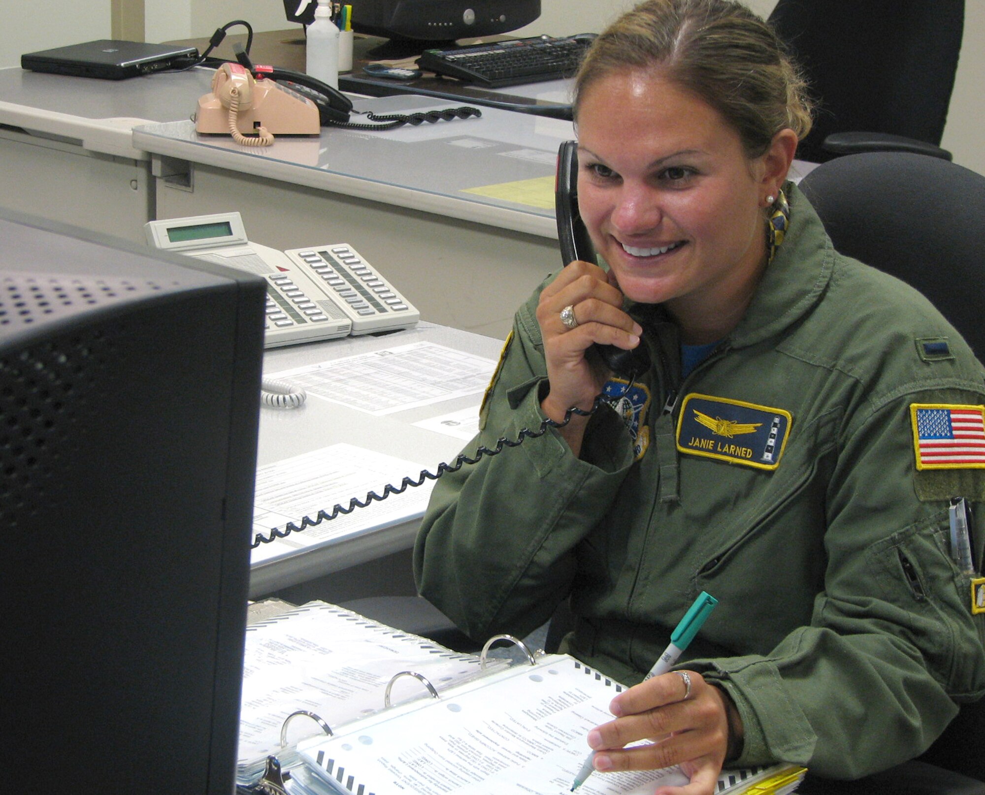 1st Lt. Jane Larned, 6th Space Warning Squadron Deputy Operations Flight Commander, performs missile warning and space surveillance operations at the Cape Cod Air Force Station, Mass. Lieutenant Larned was selected as the 21st Space Wing's First Knight award for the week of July 31, 2008. This award is designed to recognize outstanding Airmen each week for the work they do each day. (Air Force photo/Staff Sgt. Alvin Dean III) 