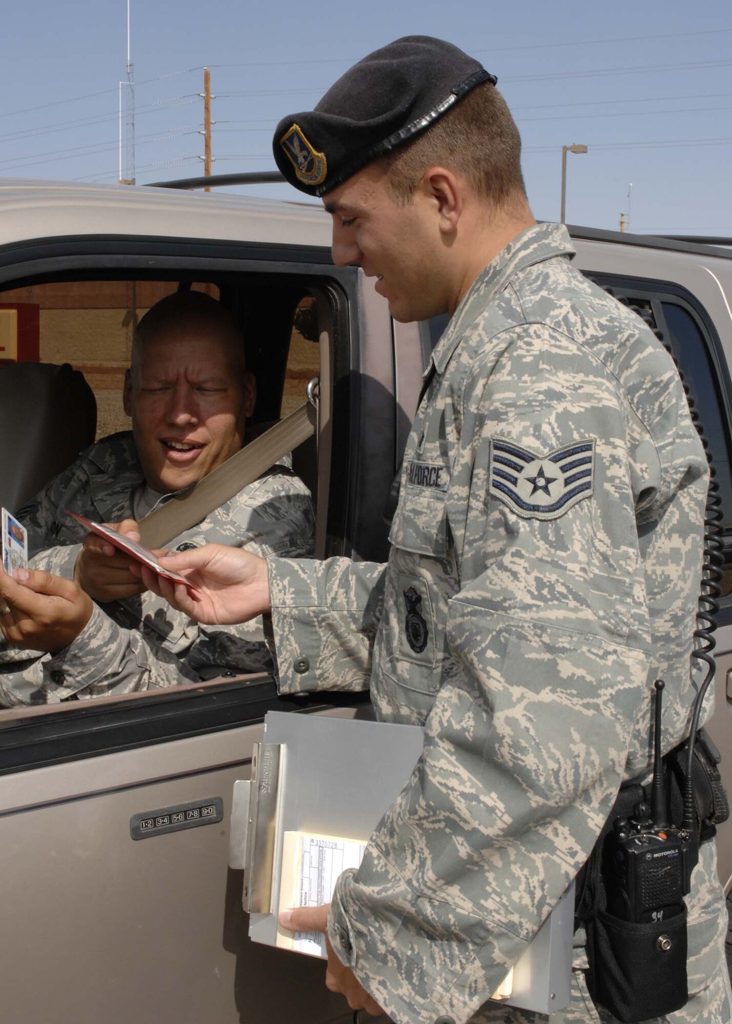 Staff Sgt. Jeremy Meyer, 49th Security Forces Squadron Alpha Flight patrolman, performs traffic control enforcement for speeding, July 25 at Holloman Air Force Base, N.M. Security forces personnel manage force protection, resource protection and information security programs involving more than 18,000 military and civilian personnel. (U.S. Air Force photo/Airman 1st Class Rachel A. Kocin)