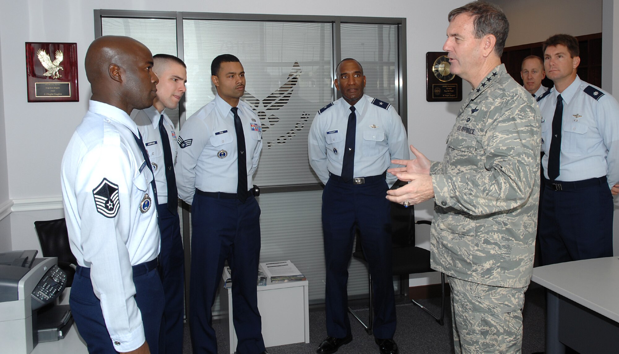 Gen. Stephen R. Lorenz shares insights with members of 341st Recruiting Squadron and Air Force Recruiting Service in the Live Oak recruiting office in Texas July 25. The 341st RCS showed the commander of Air Education and Training Command the Air Force recruiting prototype office. The facility features the new standard for office size, furnishings and interior design.  The visit marked the first AFRS tour by the major command leader since he assumed command of AETC July 2. (U.S. Air Force photo/Joel Martinez)