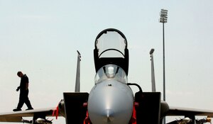 LANGLEY AIR FORCE BASE, Va. -- Staff Sgt. Harold Naggs, 71st Aircraft Maintenance Unit crew chief, performs a post flight inspection on an F-15 Eagle after it returned from Combat Archer July 26.  Combat Archer is an air-to-air system evaluation in which pilots test the reliability and effectiveness data of aircraft and missiles and complete required training for their Air Expeditionary Force cycle.   (U.S. Air Force photo/Senior Airman Vernon Young)