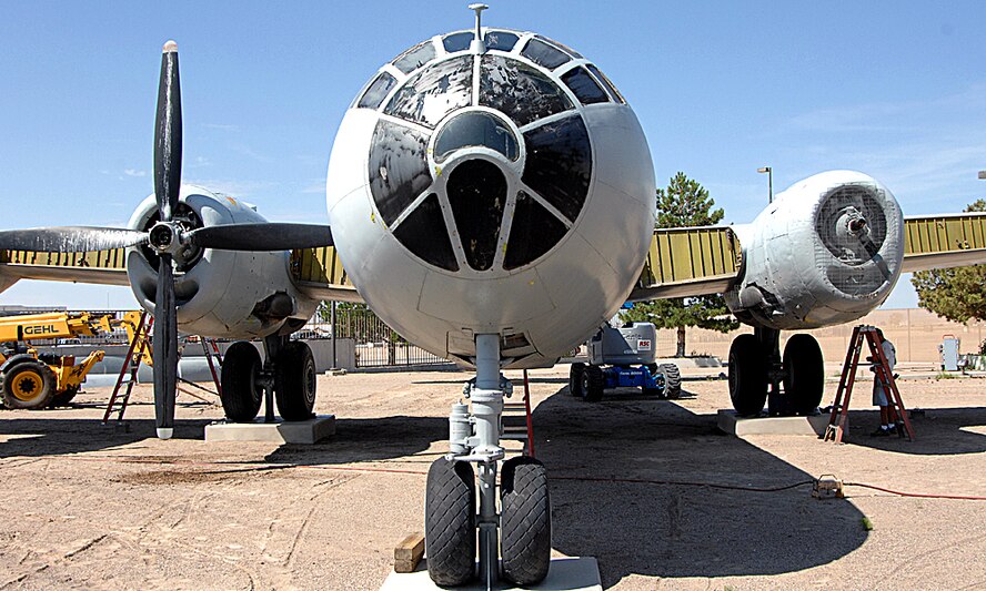 Workers take apart the World War II B-29 bomber which will be housed in the new National Museum for Nuclear Science and History under contruction near Eubank Boulevard and Southern Street, about 2 miles from Kirtland AFB.  The aircraft has been on display at the old Atomic Museum location on Wyoming Boulevard across from 377th Air Base Wing headquarters.  U.S. Air Force photo by Helga Carter