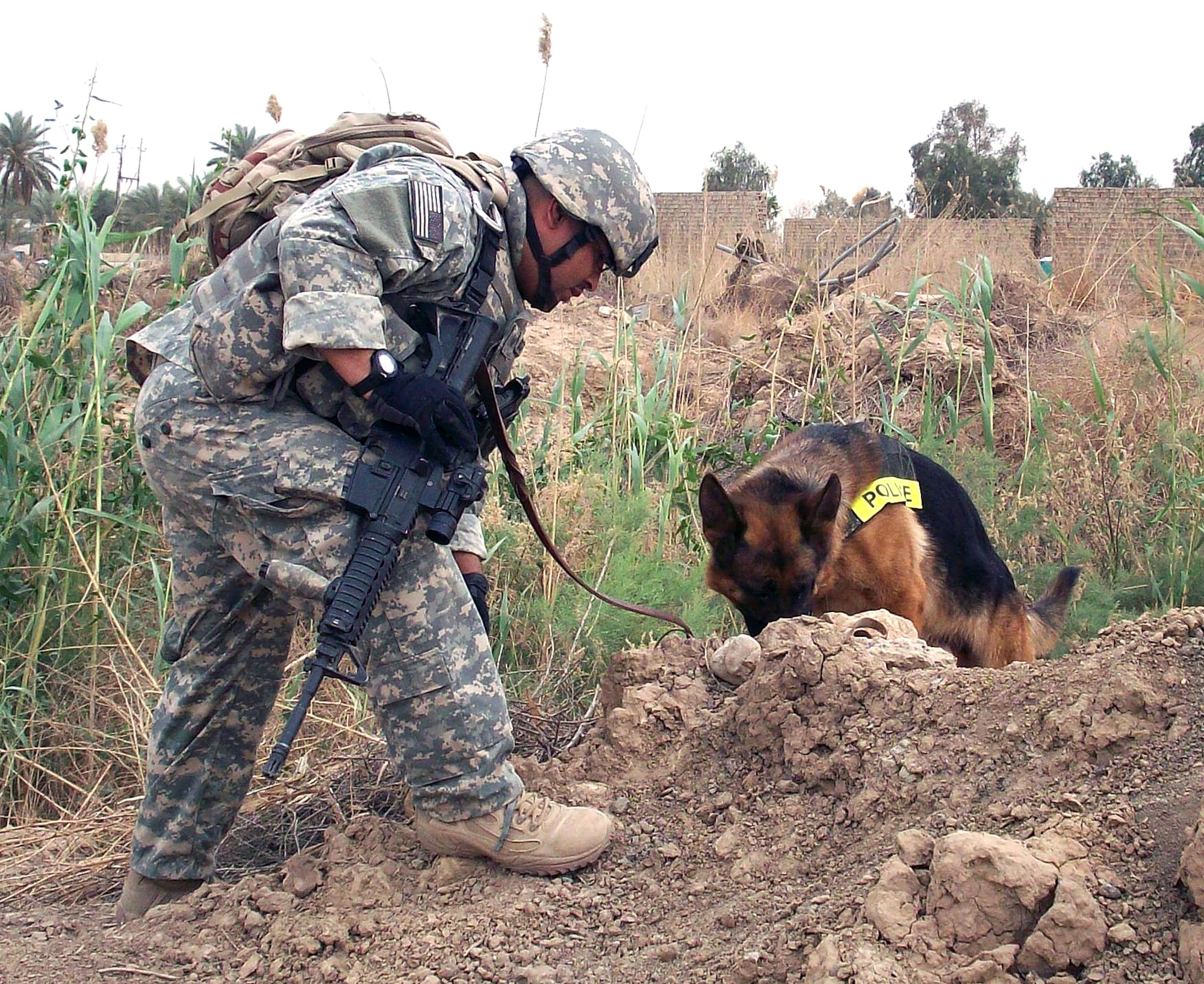 Staff Sgt. Raymond Castro, 377th Air Base Wing Security Forces Squadron, with military working dog Wisum were deployed for six months. Courtesy photo