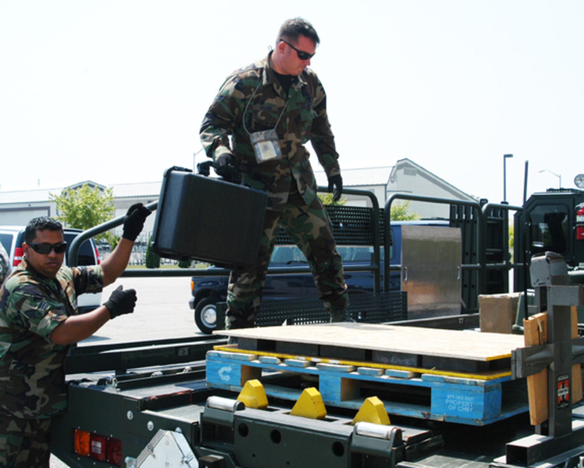 GRISSOM AIR RESERVE BASE, Ind., -- Members of the 434th Air Refueling Wing begin to load equipment as they assist members of a research team traveling to Thule Air Base, Greenland.  Transportation to the air base, located 695 miles north of the Article Circle, was via a KC-135R Stratotanker from the 434th Air Refueling Wing.  The research team included representatives from Purdue University in West Lafayette, Ind., and the Air Force Academy in Colorado Springs, Col.  (U.S. Air Force photo/Lt. Col. Gary Lockard)                                