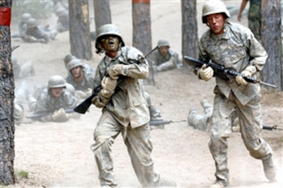 Several basic cadet trainees of the U.S. Air Force Academy's Class of 2012 participate in the assault course during Jacks Valley training at the academy in Colorado Springs, Colo., July 23, 2008. 