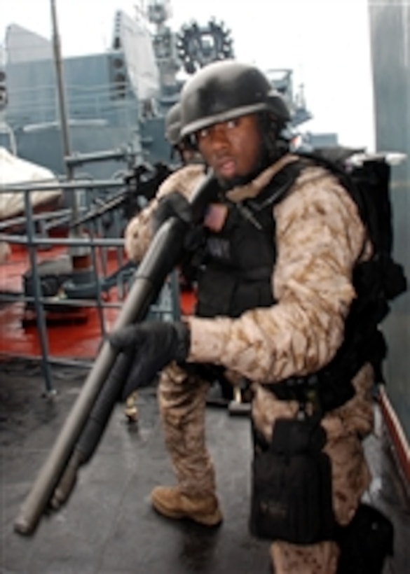 U.S. Navy Petty Officer 2nd Class Gary Weaver scans his area before allowing the visit, board, search and seizure team assigned to the guided-missile frigate USS Elrod (FFG 55) to move forward to the bridge of the Russian anti-submarine warfare ship museum Severomorsk during Northern Eagle 2008 in the Norwegian Sea on July 22, 2008.  Northern Eagle is a 12-day exercise involving the United States, Russia and Norway in the Norwegian and Barents Seas that focuses on maritime interdiction operations, search and rescue and tactical interoperability to improve maritime safety and security in Northern Europe.  