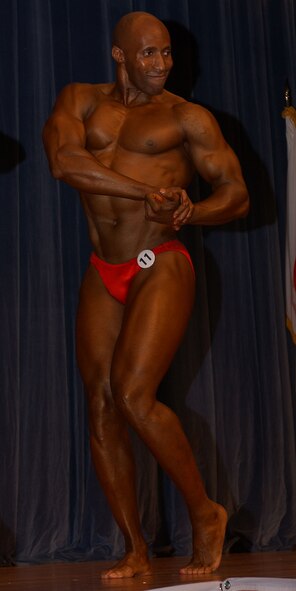 YOKOTA AIR BASE, Japan ? Dexter Robeson from Camp Zama, Japan poses for a body building competition here on July 27. This is the tenth year this competition has been held and is designed to promote fellowship between American and Japanese competitors.  Mr. Robeson won the best poser award in the heavyweight division. (U.S. Air Force photo by Airman Devin Doskey)                                 