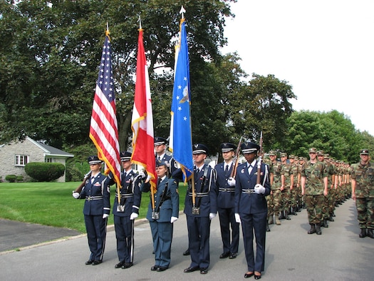 7/28/2008 - ROME, N.Y. -- Members from the Northeast Air Defense Sector stand at attention before the start of the Honor America Days Parade in Rome, N.Y. July 26. The 1.5 mile parade in Rome included a bi-national color guard and participants from NEADS, Air Force Research Laboratory, Information Directorate, and the Rome Free Academy Junior ROTC. Additionally, 2 CF-18s from the  425 Fighter Squadron, located in Bagotville, Quebec, Canada performed a flyover in honor of the North American Aerospace Defense Command's 50th Anniversary. (Photo by Master Sgt. Danny Doucette).