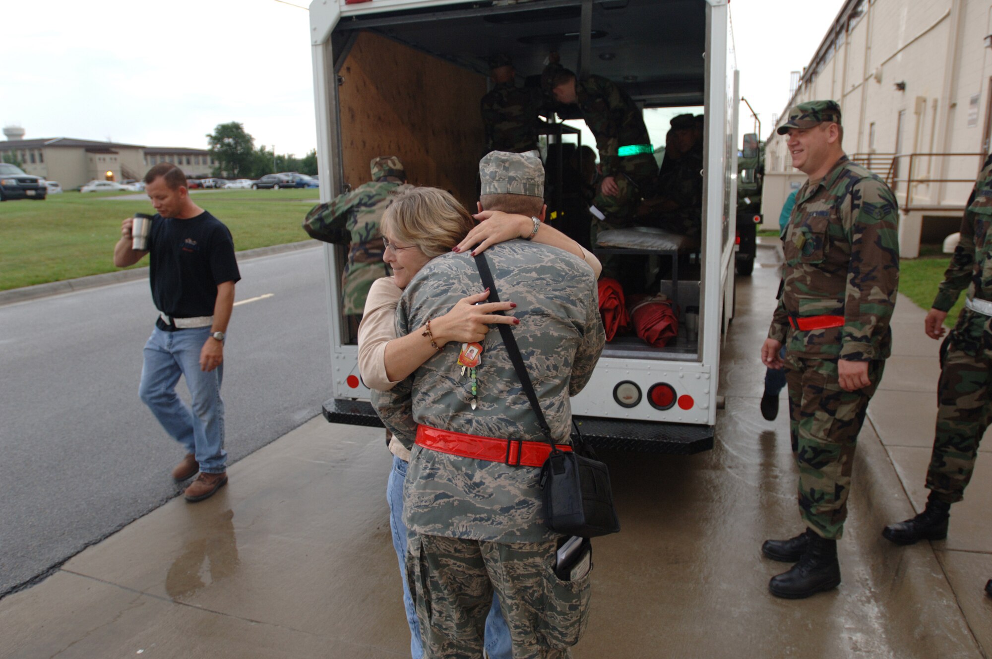 Donna Lorenz hugs her husband, Tech. Sgt. Robert Lorenz, before he deploys with his fellow Airmen to Turkey.  The 931st Aircraft Maintenance Squadron sent Sergeant Lorenz and other maintainers to Incirlik Air Base, Turkey, on July 29 in support of Operations Iraqi and Enduring Freedom.  Donna Lorenz is also a senior master sergeant assigned to the 931st Plans and Programs office. (U.S. Air Force photo/Tech Sgt. Jason Schaap)