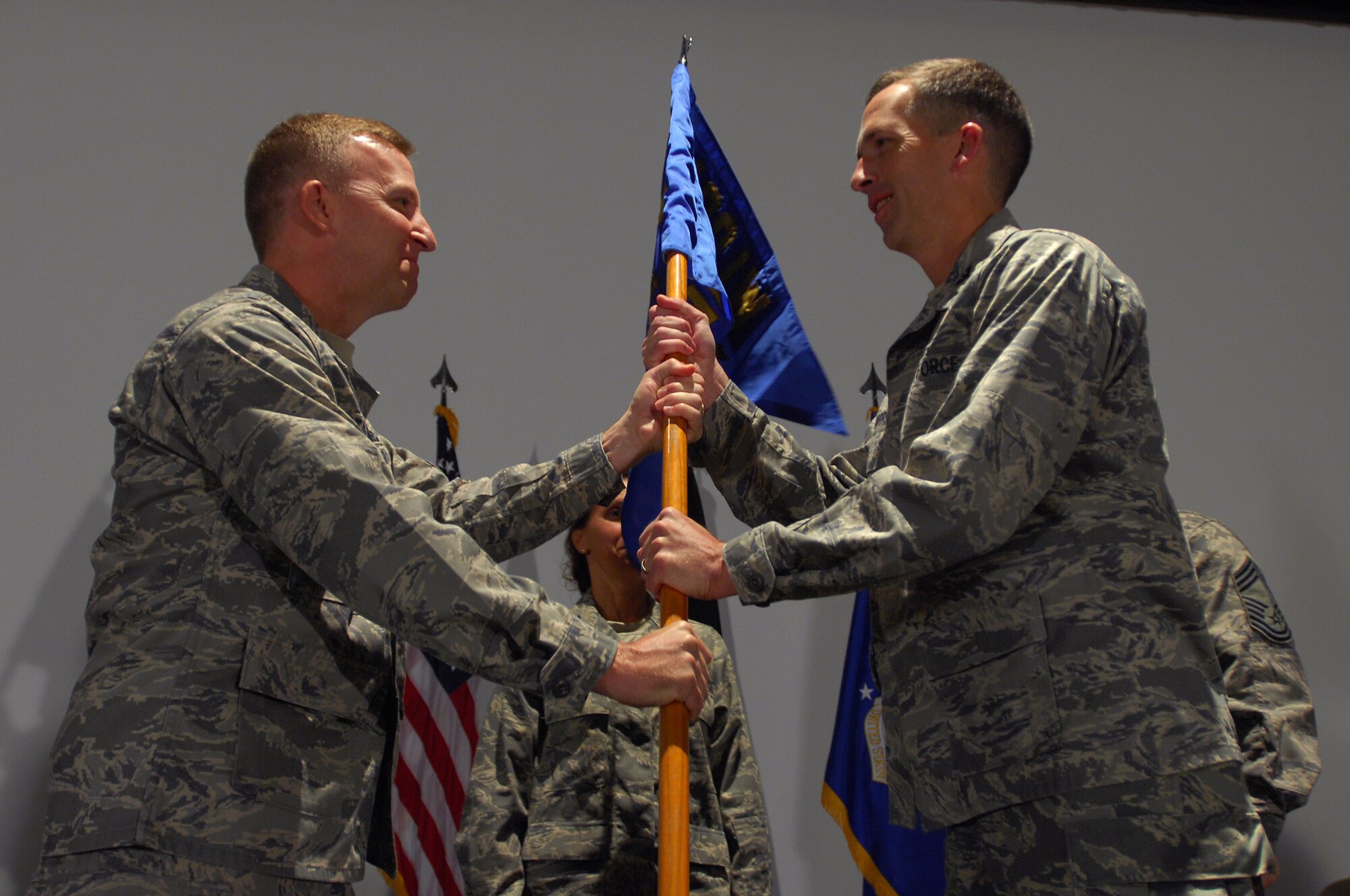 Col. James R. Marrs, (right) commander or the 480th Intelligence Wing, takes
the guidon from Col. John D. Stauffer, commander of the 70th IW, during a
reassignment ceremony July 23 at the Nightingale Theater on Ramstein. The
ceremony marked the gaining of three new groups under the command of the
480th IW. (U.S. Air Force photo/Airman 1st Class Kenny Holston)(RELEASED)

