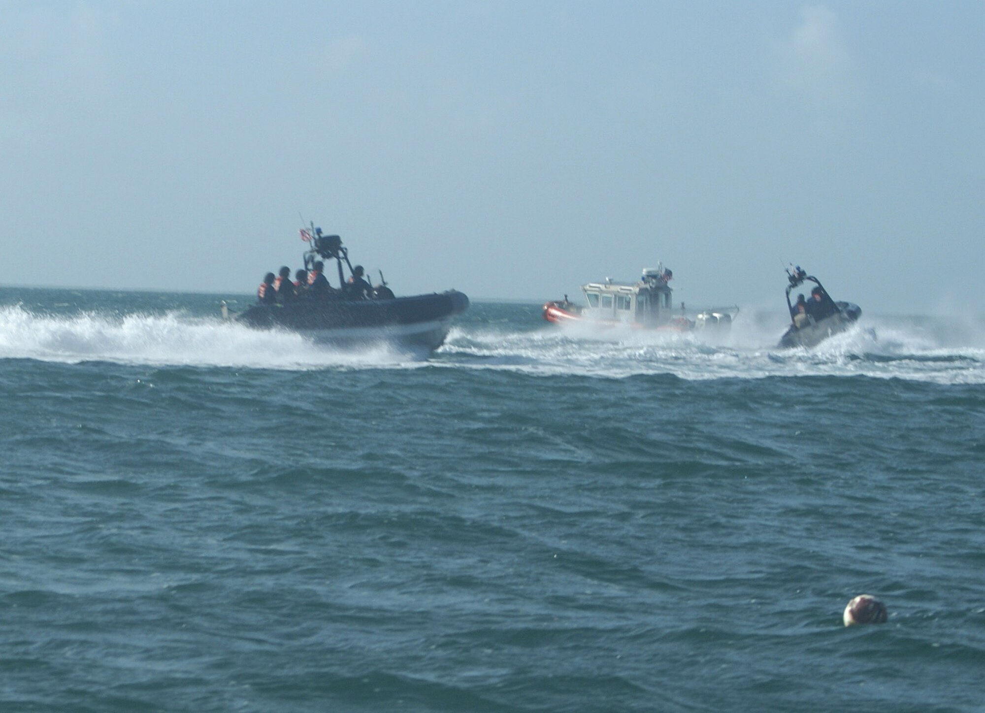 The U.S. Coast Guard Maritime Safety and Security Team (MSST) Miami, based out of Homestead Air Reserve Base, perform aggressive tactical maneuvers in the waters off of Homestead Bayfront Park. Unit members accomplished four days of “non-compliant vessel use of force pursuit training” from June 23-26 to add a new close quarters pursuit capability to their tool kit. The MSST Miami is an active-duty Coast Guard unit capable of rapid, global deployment, providing specialized capabilities and tactics to deter, detect, and counter criminal, terrorist, and other threats to national security. (U.S. Air Force photo/Staff Sgt. Erik Hofmeyer)