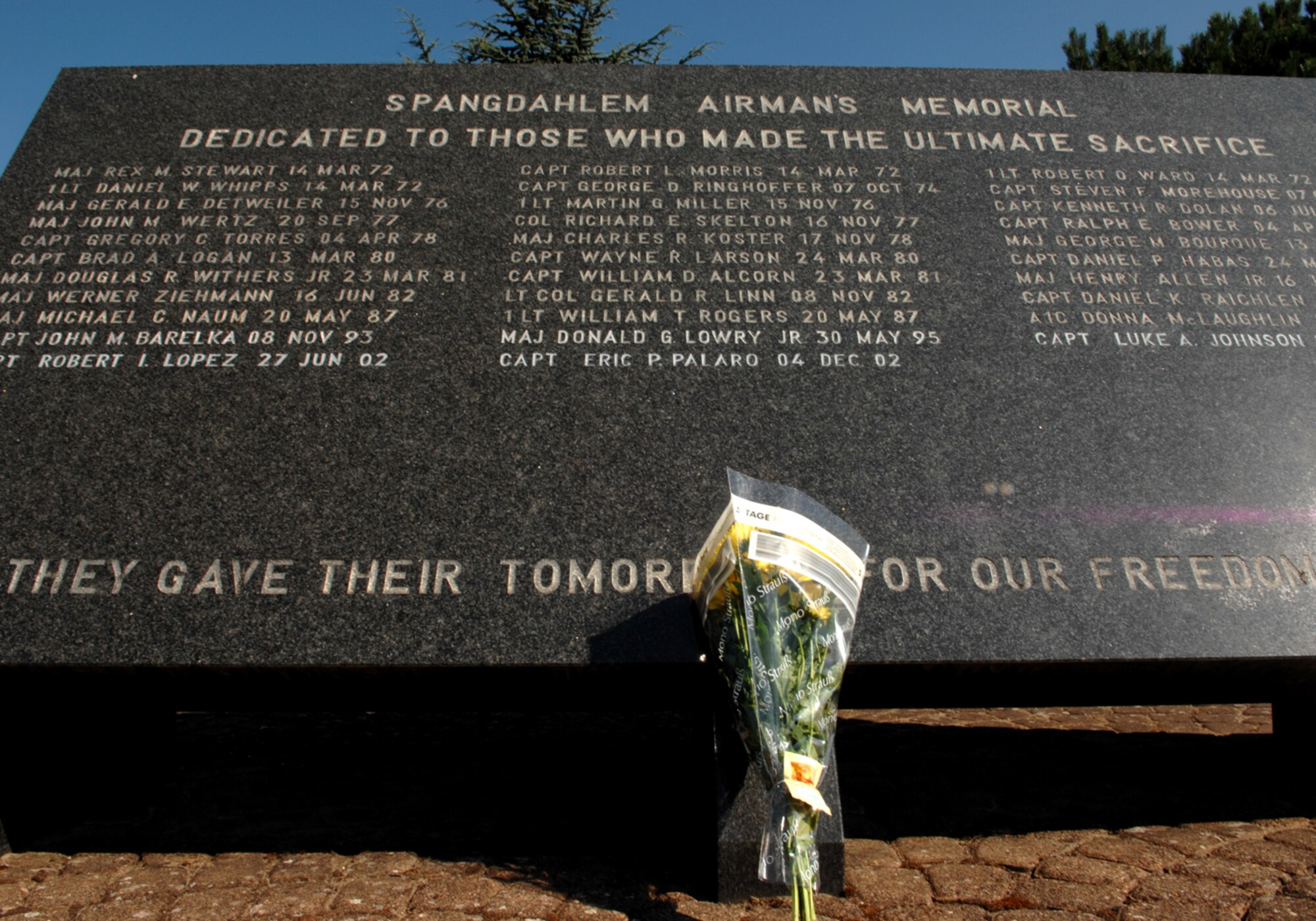 SPANGDAHLEM AIR BASE, Germany—A memorial to fallen Airmen in Spangdahlem's Air Park. Flowers were placed by Mr. Clay Skelton July 25, 2008 in memory of his father, Col. Richard E. Skelton, former 52nd Tactical Fighter Wing Commander.  This was Mr. Skelton's first return to Spangdahlem Air Base since his father suffered a heart attack while on a mission in his F-4.  (US Air Force photo by Senior Airman Logan Tuttle)
