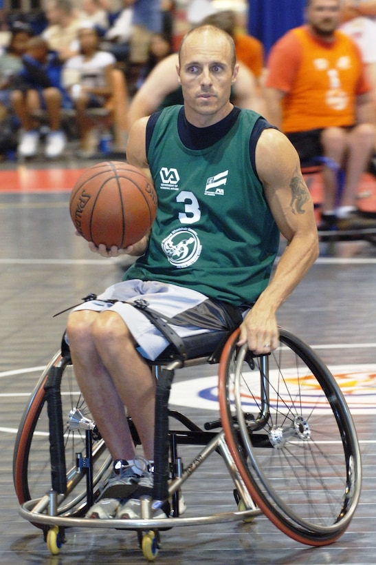 David Randall, a disabled veteran from Mansfield, Ohio, contemplates his next move during a basketball competition at the 28th National Veterans Wheelchair Games in Omaha, Neb. Department of Veterans Affairs photo