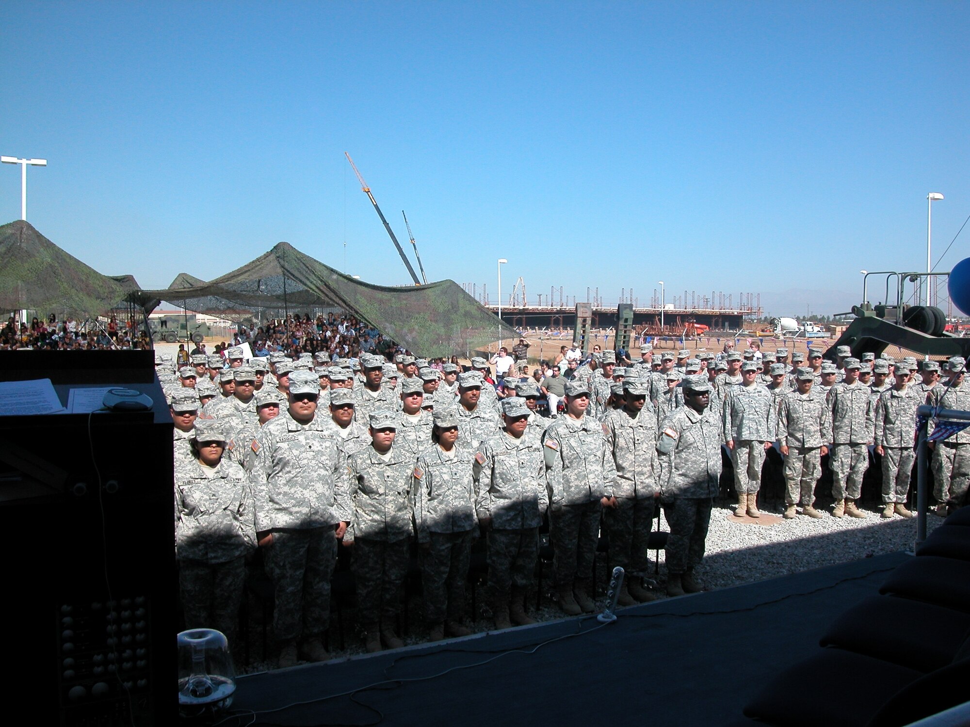 A WARM SEND-OFF: Some 200 soldiers from the 1498th Transportation Company, California Army National Guard, are given a send-off by their unit and the community at March Air Reserve Base last week as they head out for a one-year deployment in Iraq. More than 700 family members attended the event which will be their last physical contact with the Soldiers until they return in 2009. Brigadier Gen. Keith Jones, Assistant Deputy Adjutant General for California; Wally Rice, representative for Riverside County Supervisor Marion Ashley; Riverside Councilman Steve Adams and Colonel Lisa Constanza, 224th Sustainment Brigade commander, were a few of the guests present. After the formal ceremony, the troops and their families were treated to lunch at their unit while the children enjoyed playing on a bouncer and having a clown paint their faces. (U.S. Air Force photo by Maj Don Traud, 452 AMW/PA