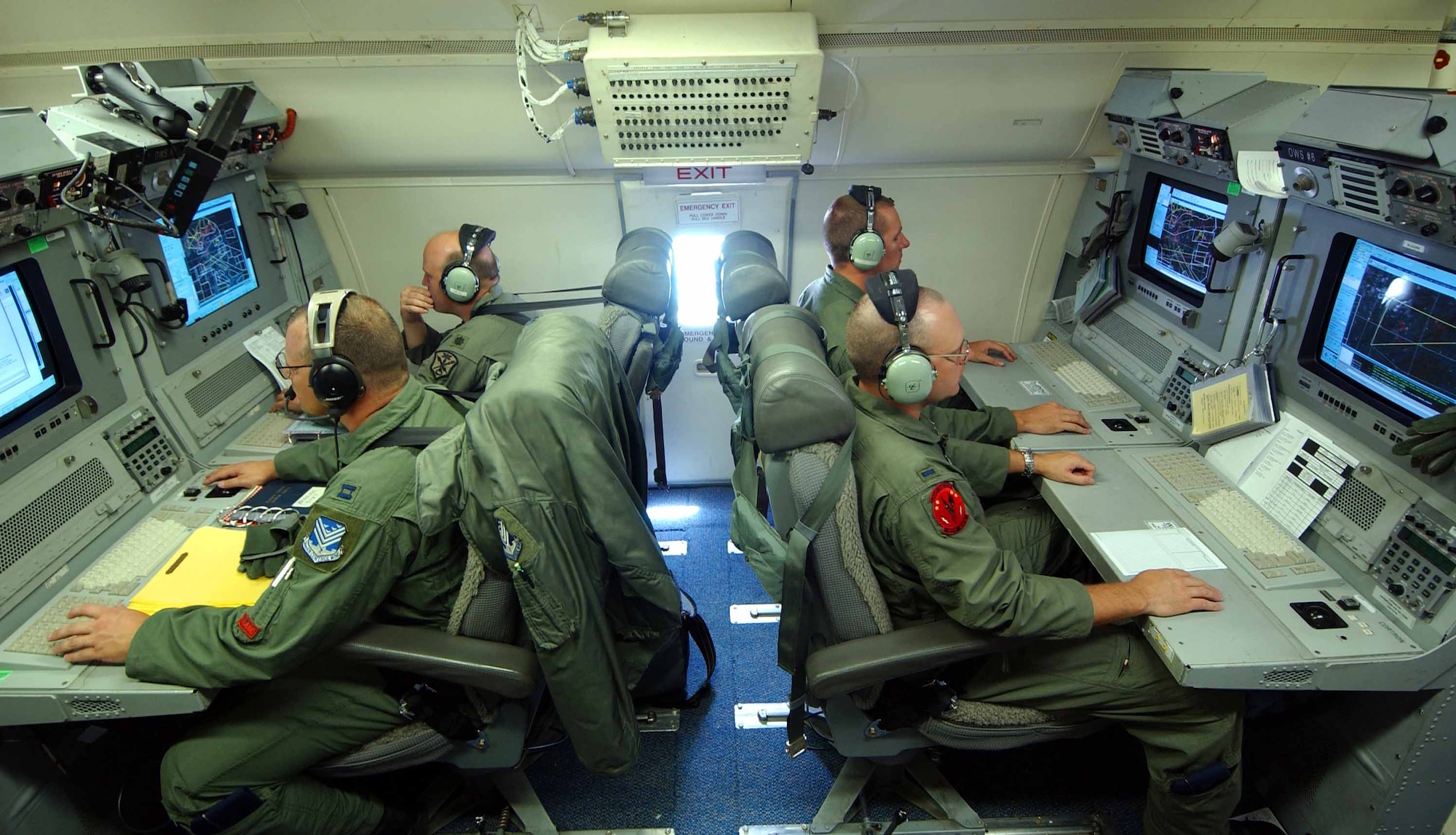 The weapon's section of the E-8C Joint Surveillance Target Attack Radar System aircraft voices targeted information to the fighter and bomber aircraft during their exercises in the Korean Peninsula area July 29. (U.S. Air Force photo/Tech. Sgt. Rey Ramon)